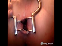 Masochist dude stretching his butthole with metal